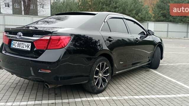 Черный Тойота Камри, объемом двигателя 2.5 л и пробегом 187 тыс. км за 11000 $, фото 3 на Automoto.ua