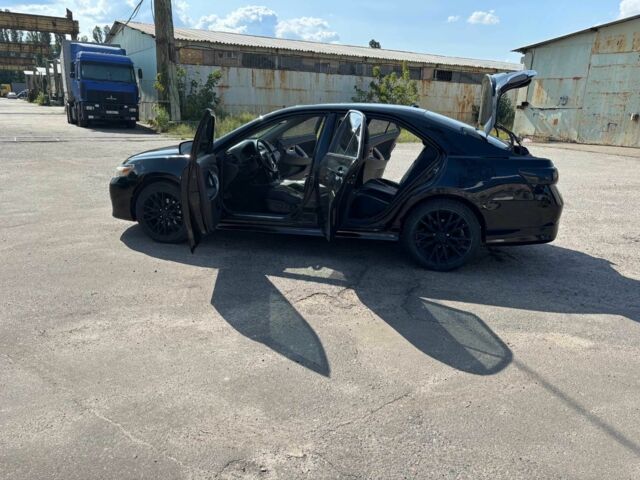 Черный Тойота Камри, объемом двигателя 2.5 л и пробегом 290 тыс. км за 8200 $, фото 6 на Automoto.ua