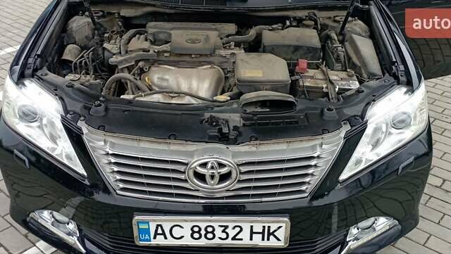 Черный Тойота Камри, объемом двигателя 2.5 л и пробегом 187 тыс. км за 11000 $, фото 17 на Automoto.ua