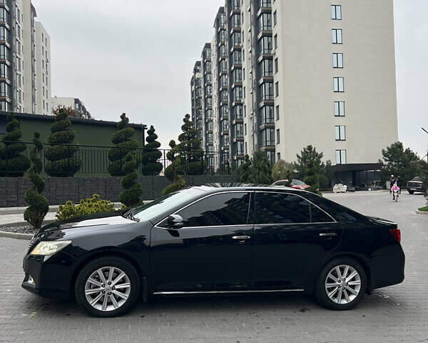 Черный Тойота Камри, объемом двигателя 3.46 л и пробегом 217 тыс. км за 13500 $, фото 15 на Automoto.ua