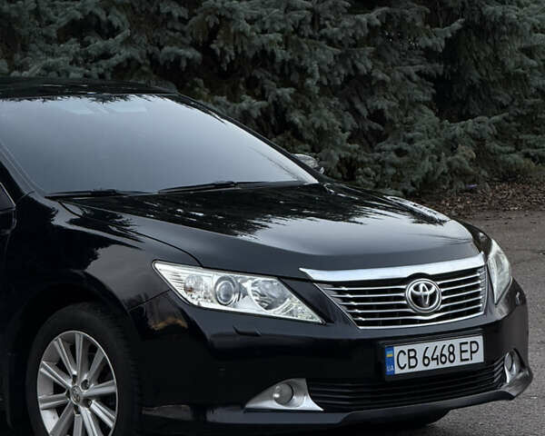 Чорний Тойота Камрі, об'ємом двигуна 2.49 л та пробігом 215 тис. км за 14500 $, фото 1 на Automoto.ua