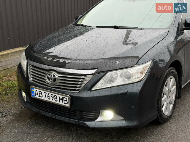 Чорний Тойота Камрі, об'ємом двигуна 2.49 л та пробігом 290 тис. км за 9700 $, фото 1 на Automoto.ua