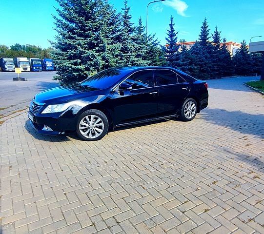 Чорний Тойота Камрі, об'ємом двигуна 2.5 л та пробігом 180 тис. км за 13100 $, фото 1 на Automoto.ua