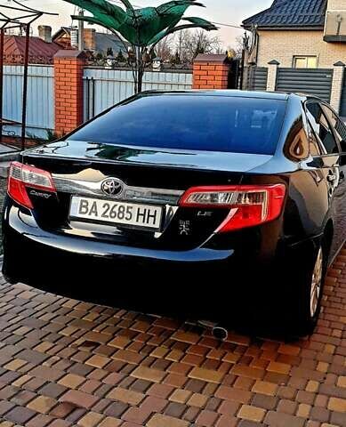 Черный Тойота Камри, объемом двигателя 2.5 л и пробегом 154 тыс. км за 9490 $, фото 12 на Automoto.ua