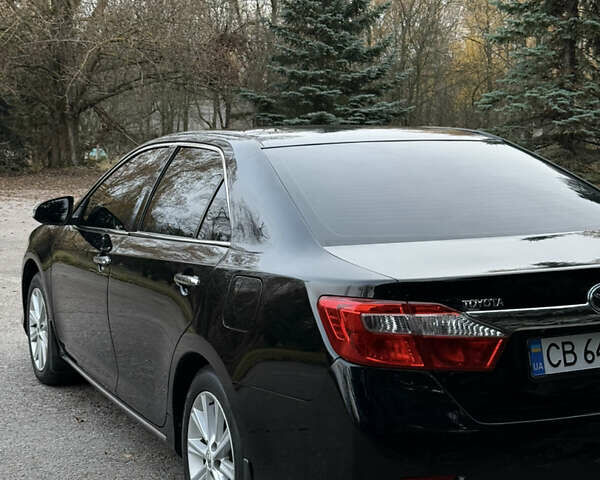 Чорний Тойота Камрі, об'ємом двигуна 2.49 л та пробігом 215 тис. км за 14500 $, фото 6 на Automoto.ua