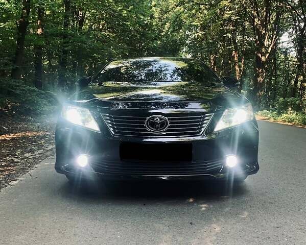 Черный Тойота Камри, объемом двигателя 2.5 л и пробегом 250 тыс. км за 13000 $, фото 12 на Automoto.ua