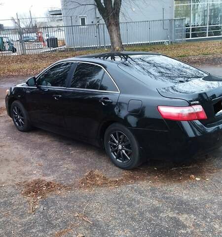 Черный Тойота Камри, объемом двигателя 2.36 л и пробегом 248 тыс. км за 10500 $, фото 2 на Automoto.ua