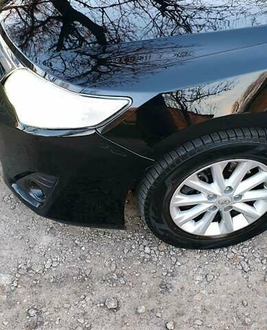 Черный Тойота Камри, объемом двигателя 2.5 л и пробегом 154 тыс. км за 9490 $, фото 22 на Automoto.ua