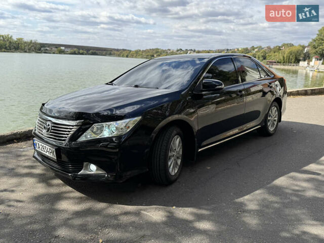 Черный Тойота Камри, объемом двигателя 2.49 л и пробегом 210 тыс. км за 13500 $, фото 16 на Automoto.ua
