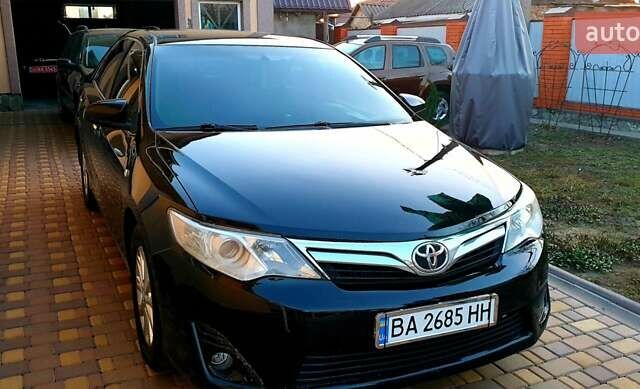 Черный Тойота Камри, объемом двигателя 2.5 л и пробегом 154 тыс. км за 9490 $, фото 9 на Automoto.ua