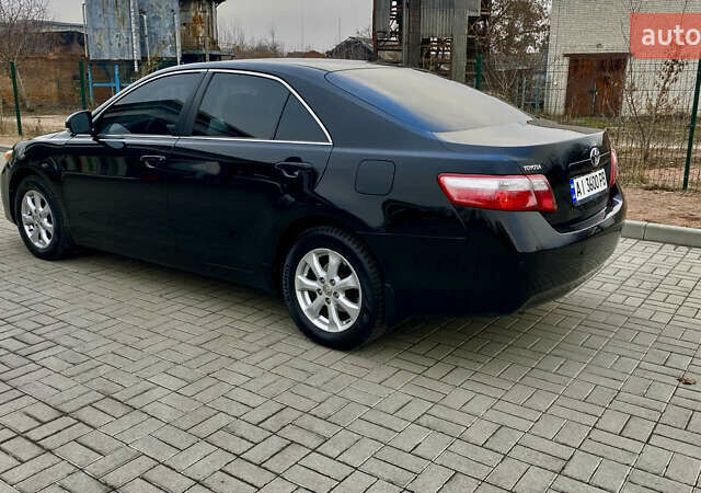 Черный Тойота Камри, объемом двигателя 2.4 л и пробегом 315 тыс. км за 9799 $, фото 10 на Automoto.ua