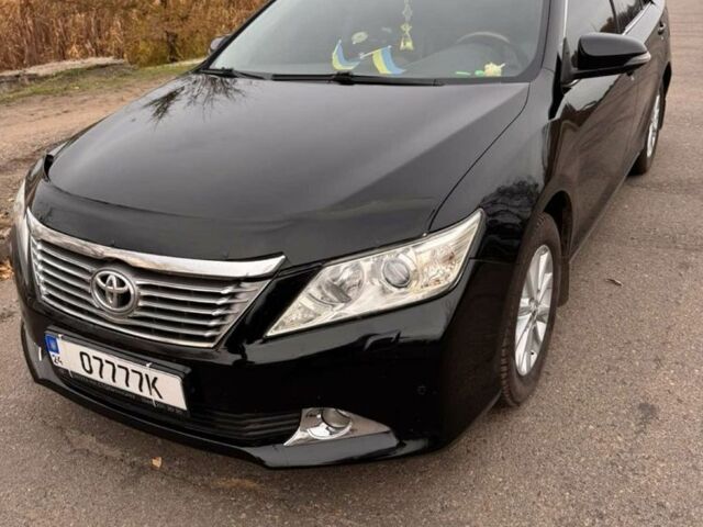 Черный Тойота Камри, объемом двигателя 2.5 л и пробегом 233 тыс. км за 11000 $, фото 1 на Automoto.ua