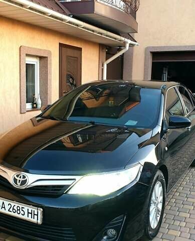 Черный Тойота Камри, объемом двигателя 2.5 л и пробегом 154 тыс. км за 9490 $, фото 23 на Automoto.ua