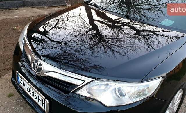 Черный Тойота Камри, объемом двигателя 2.5 л и пробегом 154 тыс. км за 9490 $, фото 5 на Automoto.ua