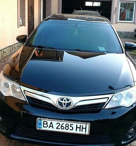 Черный Тойота Камри, объемом двигателя 2.5 л и пробегом 154 тыс. км за 9490 $, фото 7 на Automoto.ua