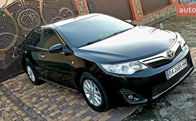 Черный Тойота Камри, объемом двигателя 2.5 л и пробегом 154 тыс. км за 9490 $, фото 13 на Automoto.ua