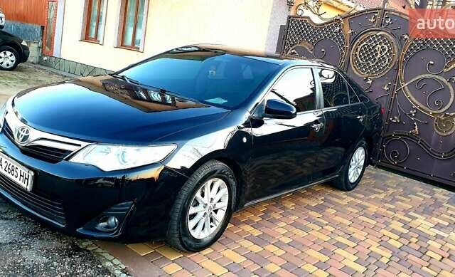 Черный Тойота Камри, объемом двигателя 2.5 л и пробегом 154 тыс. км за 9490 $, фото 15 на Automoto.ua