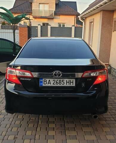 Черный Тойота Камри, объемом двигателя 2.5 л и пробегом 154 тыс. км за 9490 $, фото 30 на Automoto.ua