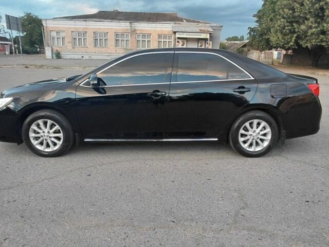 Черный Тойота Камри, объемом двигателя 2.5 л и пробегом 263 тыс. км за 13200 $, фото 8 на Automoto.ua