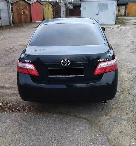 Черный Тойота Камри, объемом двигателя 2.36 л и пробегом 248 тыс. км за 10100 $, фото 9 на Automoto.ua
