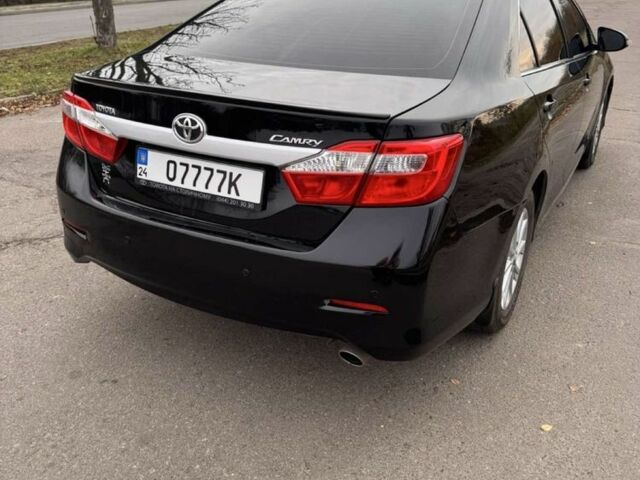 Черный Тойота Камри, объемом двигателя 2.5 л и пробегом 233 тыс. км за 11000 $, фото 3 на Automoto.ua
