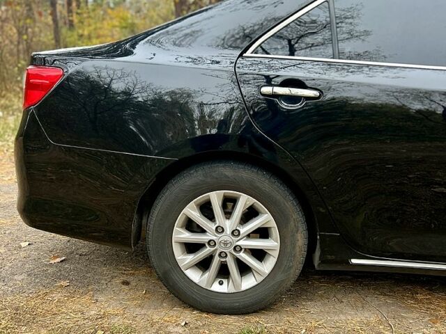 Черный Тойота Камри, объемом двигателя 2.5 л и пробегом 210 тыс. км за 10000 $, фото 5 на Automoto.ua