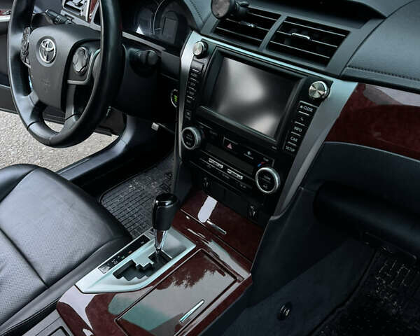 Чорний Тойота Камрі, об'ємом двигуна 2.49 л та пробігом 215 тис. км за 14500 $, фото 13 на Automoto.ua