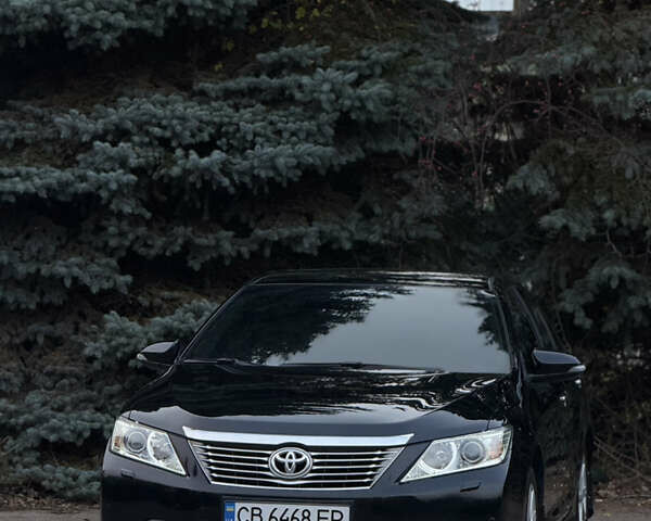 Чорний Тойота Камрі, об'ємом двигуна 2.49 л та пробігом 215 тис. км за 14500 $, фото 3 на Automoto.ua