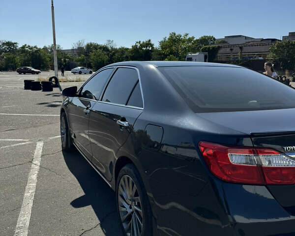 Черный Тойота Камри, объемом двигателя 3.5 л и пробегом 213 тыс. км за 15200 $, фото 4 на Automoto.ua