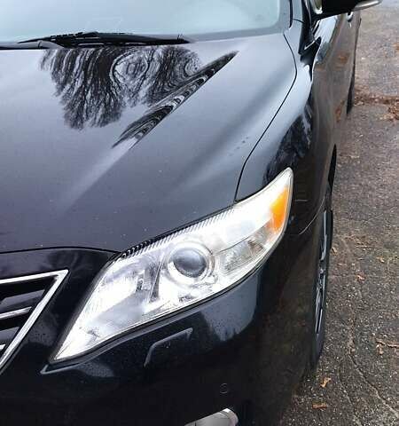 Черный Тойота Камри, объемом двигателя 2.36 л и пробегом 248 тыс. км за 10500 $, фото 4 на Automoto.ua