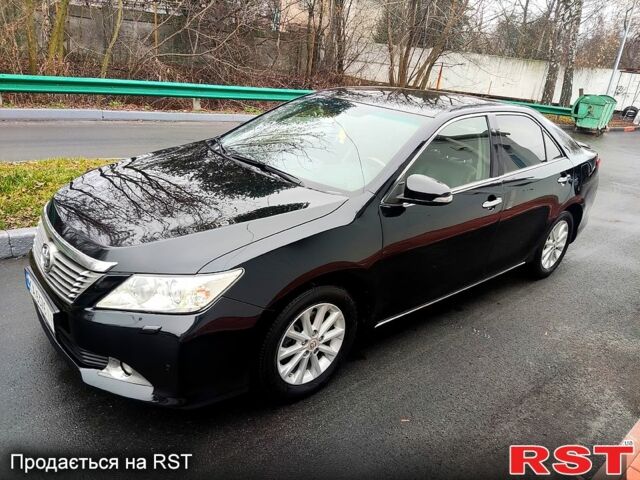 Чорний Тойота Камрі, об'ємом двигуна 2.5 л та пробігом 225 тис. км за 14700 $, фото 1 на Automoto.ua