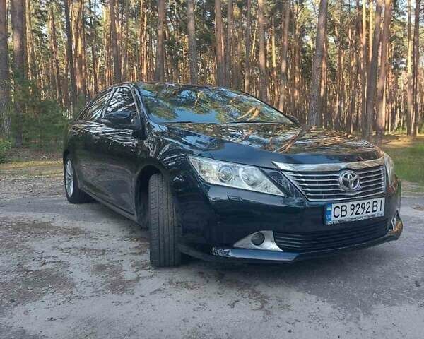 Черный Тойота Камри, объемом двигателя 2.5 л и пробегом 260 тыс. км за 13600 $, фото 2 на Automoto.ua