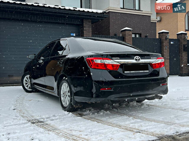 Черный Тойота Камри, объемом двигателя 2.5 л и пробегом 195 тыс. км за 13850 $, фото 91 на Automoto.ua