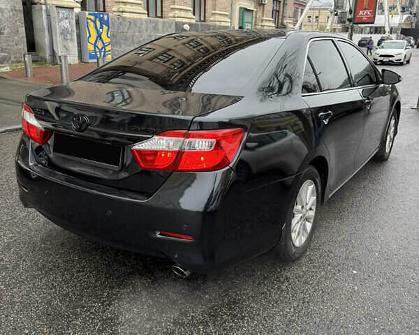 Черный Тойота Камри, объемом двигателя 2.5 л и пробегом 280 тыс. км за 10999 $, фото 4 на Automoto.ua
