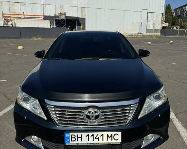 Черный Тойота Камри, объемом двигателя 3.5 л и пробегом 213 тыс. км за 15200 $, фото 1 на Automoto.ua