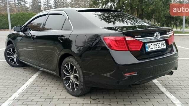 Черный Тойота Камри, объемом двигателя 2.5 л и пробегом 187 тыс. км за 11000 $, фото 4 на Automoto.ua