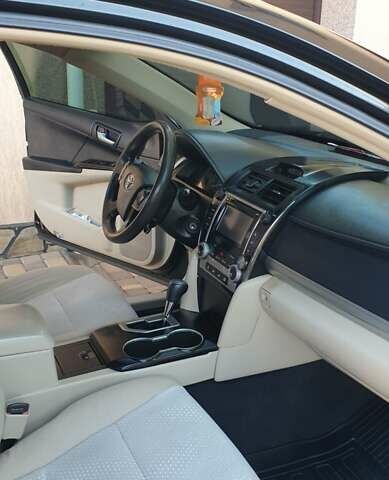 Черный Тойота Камри, объемом двигателя 2.5 л и пробегом 154 тыс. км за 9490 $, фото 52 на Automoto.ua