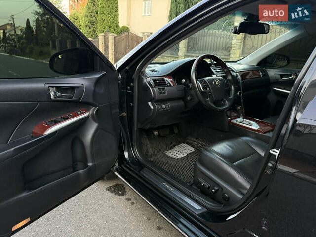 Чорний Тойота Камрі, об'ємом двигуна 3.46 л та пробігом 210 тис. км за 13500 $, фото 15 на Automoto.ua