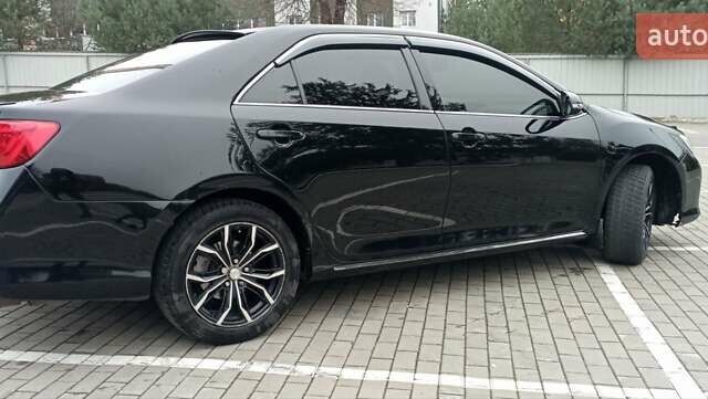 Черный Тойота Камри, объемом двигателя 2.5 л и пробегом 187 тыс. км за 11000 $, фото 2 на Automoto.ua