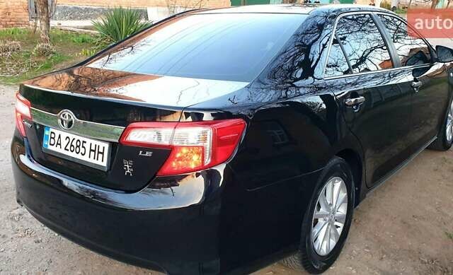 Черный Тойота Камри, объемом двигателя 2.5 л и пробегом 154 тыс. км за 9490 $, фото 19 на Automoto.ua
