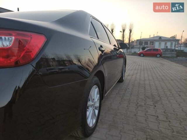 Черный Тойота Камри, объемом двигателя 2.5 л и пробегом 294 тыс. км за 12000 $, фото 11 на Automoto.ua