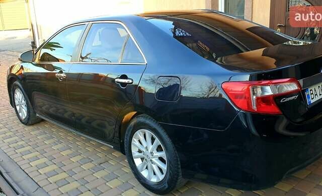 Черный Тойота Камри, объемом двигателя 2.5 л и пробегом 154 тыс. км за 9490 $, фото 37 на Automoto.ua