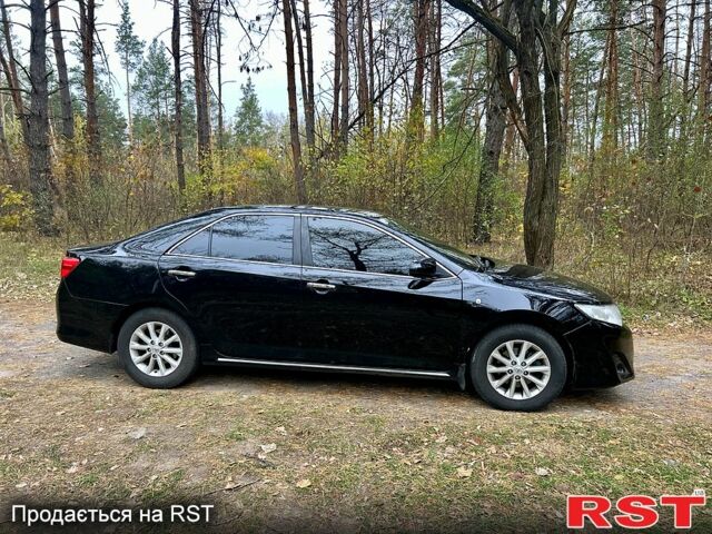 Черный Тойота Камри, объемом двигателя 2.5 л и пробегом 210 тыс. км за 10000 $, фото 1 на Automoto.ua