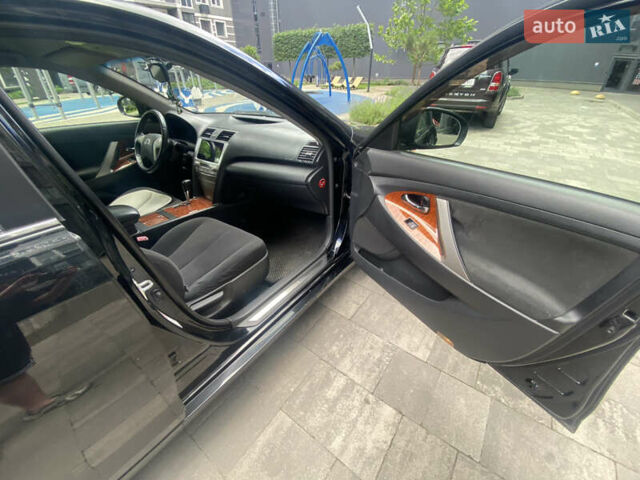 Чорний Тойота Камрі, об'ємом двигуна 2.4 л та пробігом 260 тис. км за 10000 $, фото 19 на Automoto.ua