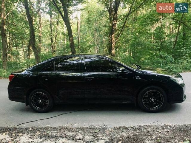 Черный Тойота Камри, объемом двигателя 2.5 л и пробегом 250 тыс. км за 13000 $, фото 32 на Automoto.ua