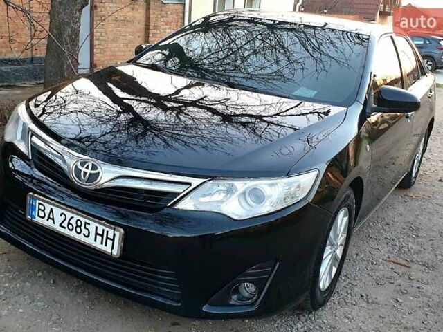 Черный Тойота Камри, объемом двигателя 2.5 л и пробегом 154 тыс. км за 9490 $, фото 17 на Automoto.ua