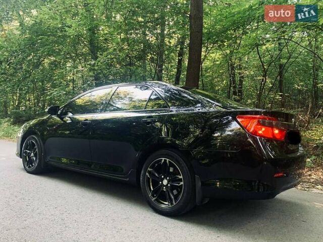 Черный Тойота Камри, объемом двигателя 2.5 л и пробегом 250 тыс. км за 13000 $, фото 6 на Automoto.ua