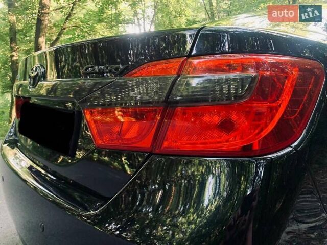 Черный Тойота Камри, объемом двигателя 2.5 л и пробегом 250 тыс. км за 13000 $, фото 24 на Automoto.ua