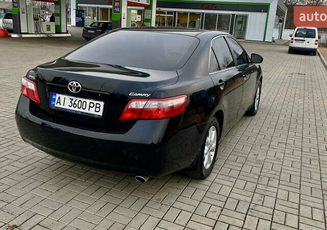 Черный Тойота Камри, объемом двигателя 2.4 л и пробегом 315 тыс. км за 9799 $, фото 3 на Automoto.ua