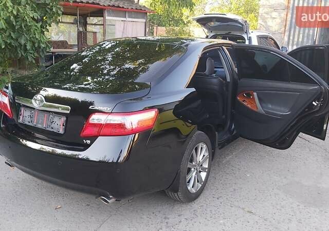 Черный Тойота Камри, объемом двигателя 3.46 л и пробегом 192 тыс. км за 15200 $, фото 2 на Automoto.ua
